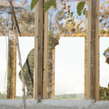 reflections on thewindow of the tiny house